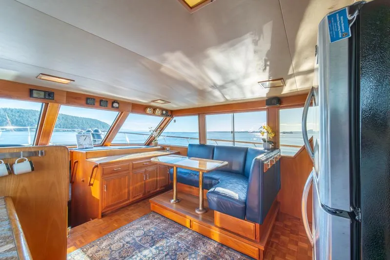 Take Chances Yacht Photos Pics Luxurious 1986 Ocean Alexander Cockpit M/Y interior with panoramic windows and elegant seating.