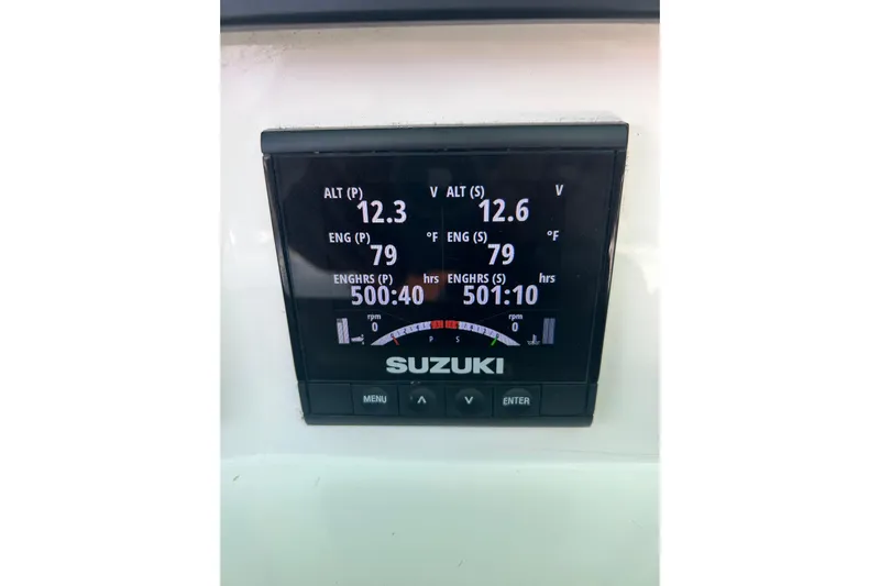  Yacht Photos Pics Digital display on 2009 Venture 34 Tournament boat showing engine metrics.