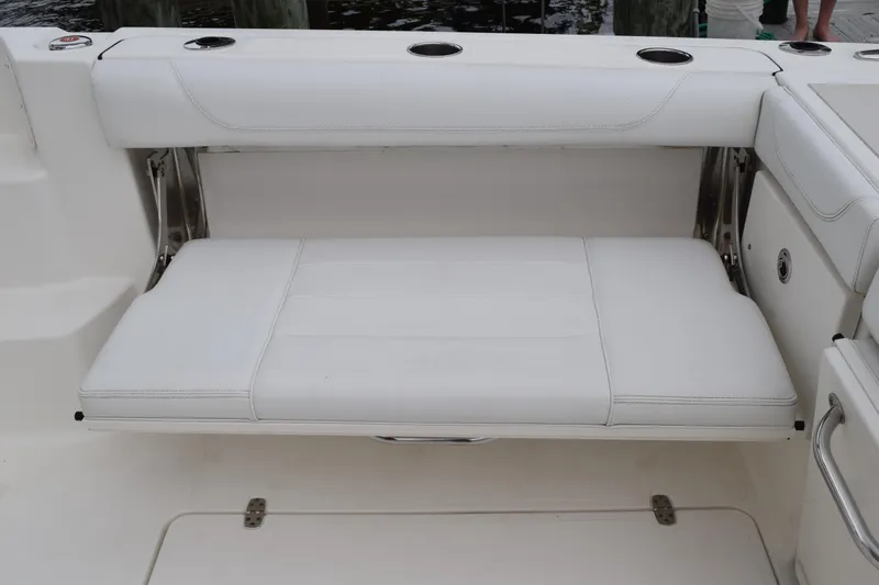  Yacht Photos Pics 2022 Pursuit OS 355 Offshore boat with white cushioned seating.