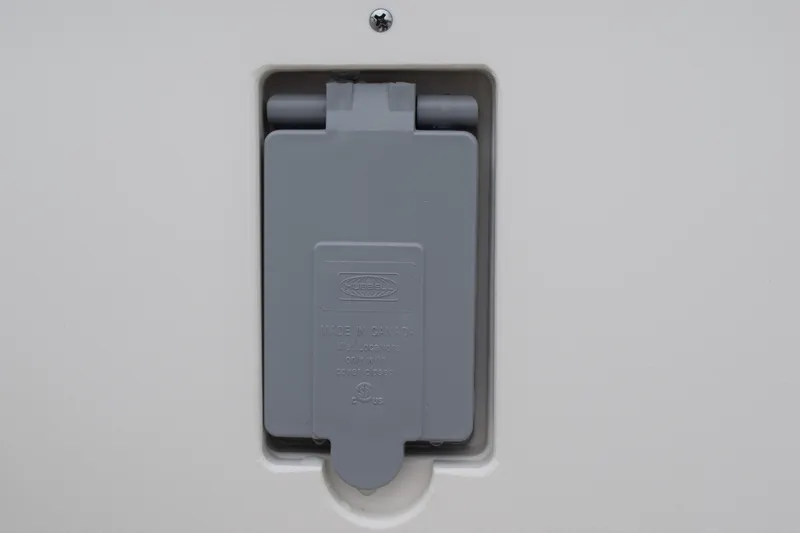  Yacht Photos Pics Gray electrical outlet cover on 2022 Pursuit OS 355 Offshore boat.