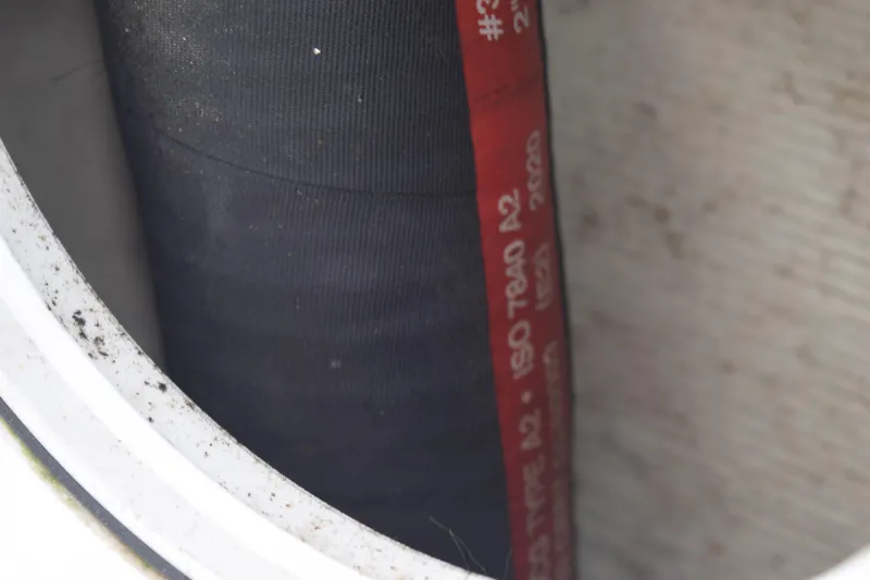  Yacht Photos Pics Close-up of a hose inside a 2022 Pursuit OS 355 Offshore boat.