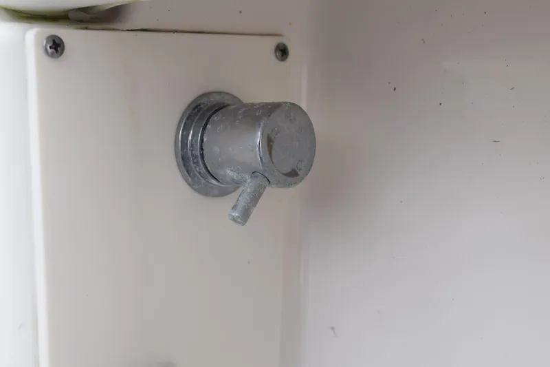  Yacht Photos Pics Close-up of a metal knob on a 2022 Pursuit OS 355 Offshore boat.