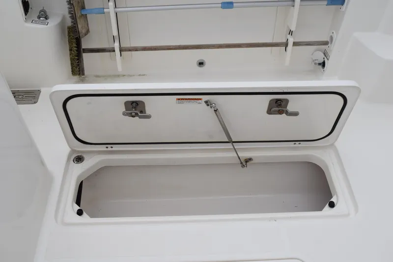  Yacht Photos Pics Open storage compartment on 2022 Pursuit OS 355 Offshore boat deck.