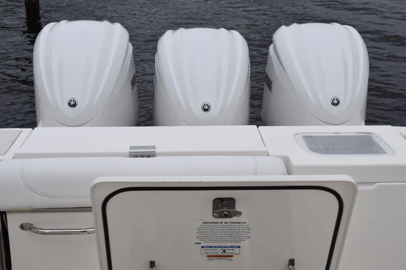  Yacht Photos Pics Triple outboard engines on a 2022 Pursuit OS 355 Offshore boat.