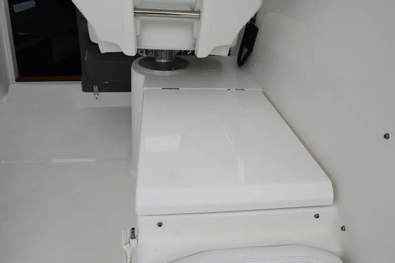  Yacht Photos Pics 2022 Pursuit OS 355 Offshore boat interior, featuring sleek white seating and modern design.