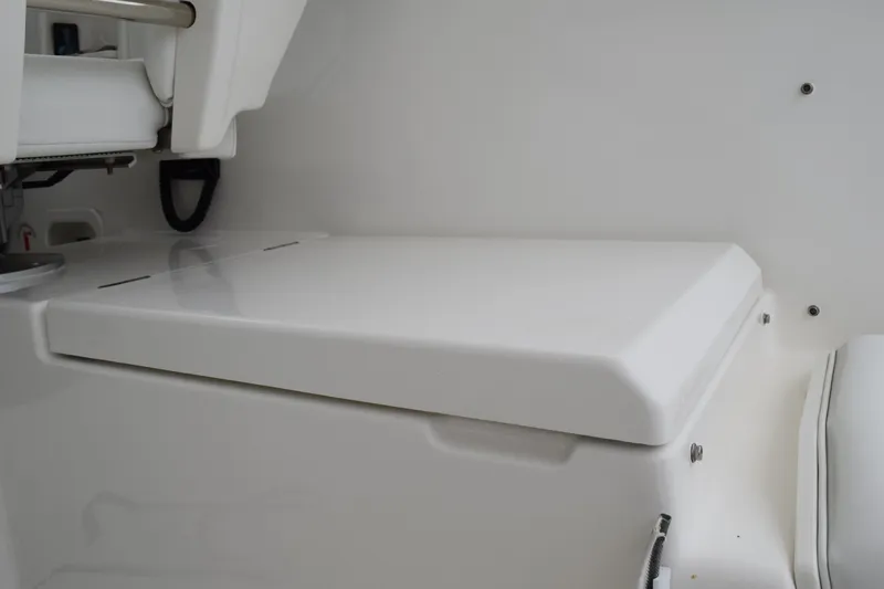  Yacht Photos Pics 2022 Pursuit OS 355 Offshore boat interior seating area, white and sleek design.