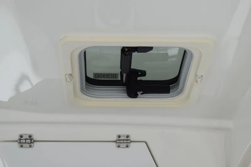  Yacht Photos Pics 2022 Pursuit OS 355 Offshore boat hatch with secure locking mechanism.