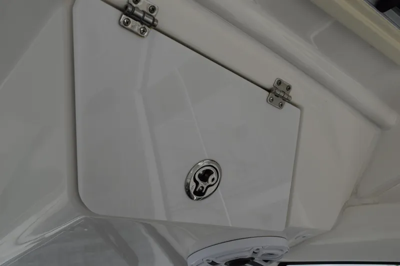  Yacht Photos Pics 2022 Pursuit OS 355 Offshore boat compartment with secure latch and hinges.