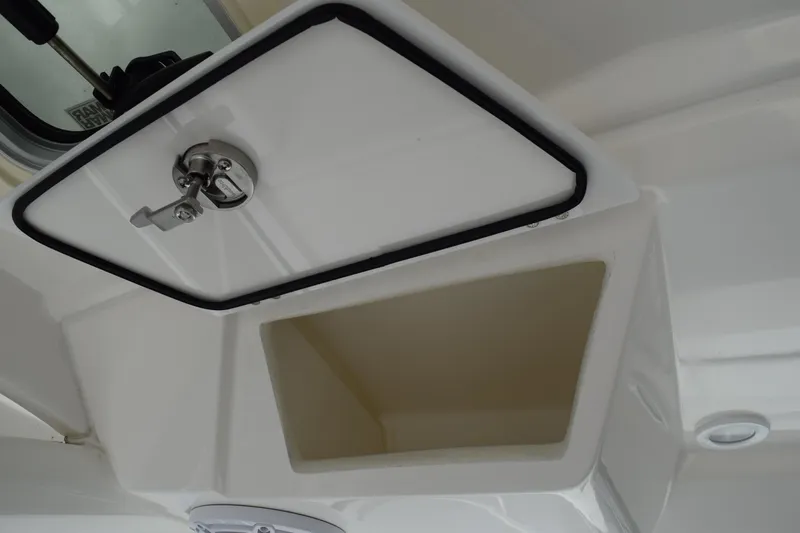  Yacht Photos Pics 2022 Pursuit OS 355 Offshore storage compartment with secure latch.