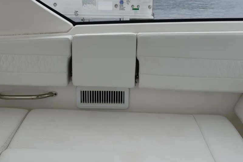  Yacht Photos Pics Interior of 2022 Pursuit OS 355 Offshore boat with white seating and vent.