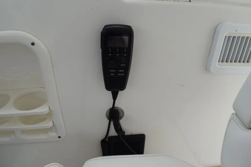  Yacht Photos Pics VHF radio mounted on 2022 Pursuit OS 355 Offshore boat interior.