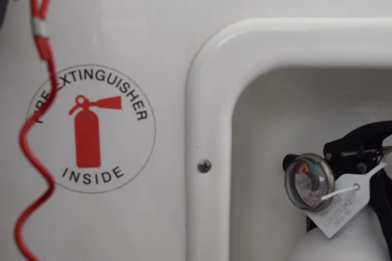  Yacht Photos Pics Fire extinguisher compartment on 2022 Pursuit OS 355 Offshore boat.