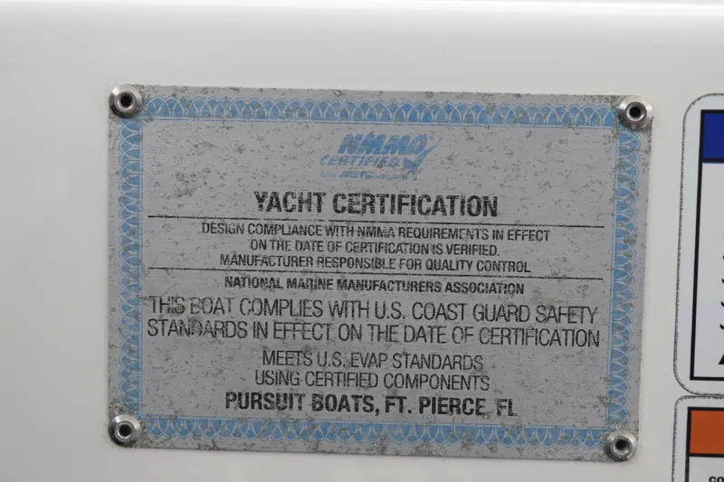  Yacht Photos Pics 2022 Pursuit OS 355 Offshore yacht certification plaque, NMMA compliance, U.S. Coast Guard standards.
