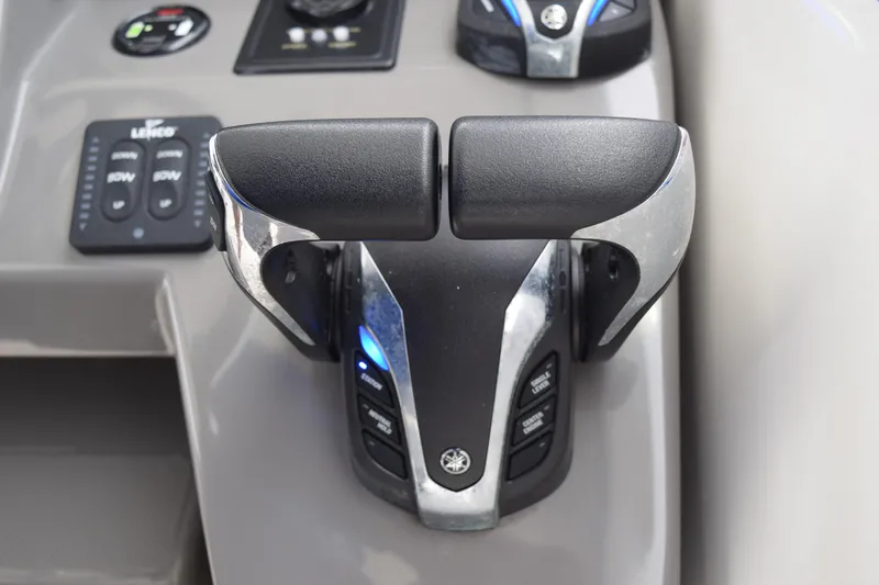  Yacht Photos Pics Throttle controls on 2022 Pursuit OS 355 Offshore boat dashboard.