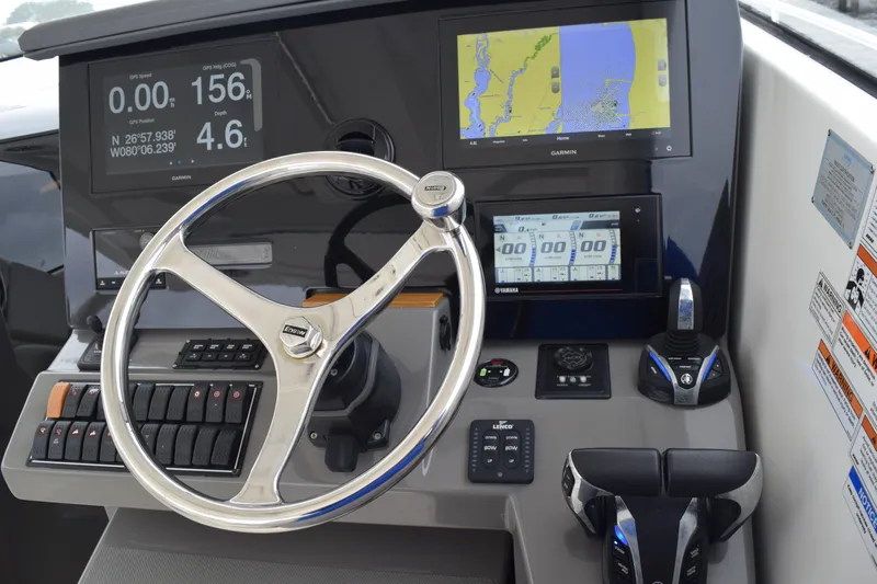  Yacht Photos Pics 2022 Pursuit OS 355 Offshore helm with advanced navigation and control systems.