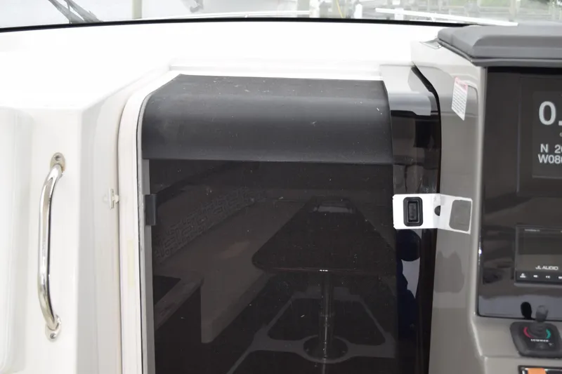  Yacht Photos Pics 2022 Pursuit OS 355 Offshore cabin entrance with control panel.