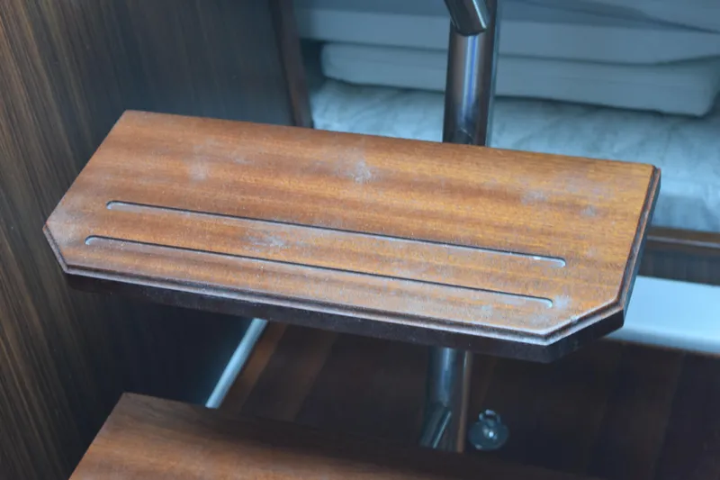  Yacht Photos Pics Wooden step detail on 2022 Pursuit OS 355 Offshore boat interior.