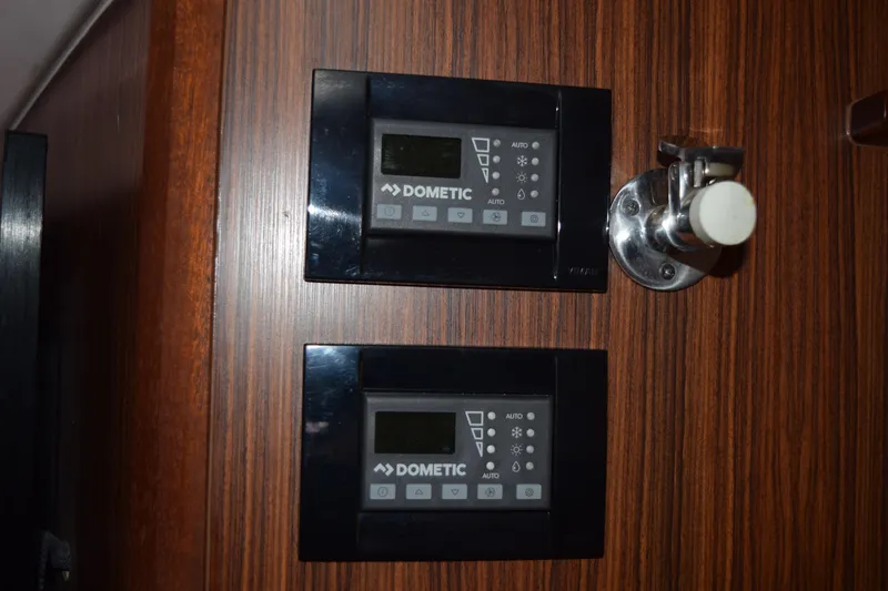  Yacht Photos Pics Dometic control panels on 2022 Pursuit OS 355 Offshore boat interior.