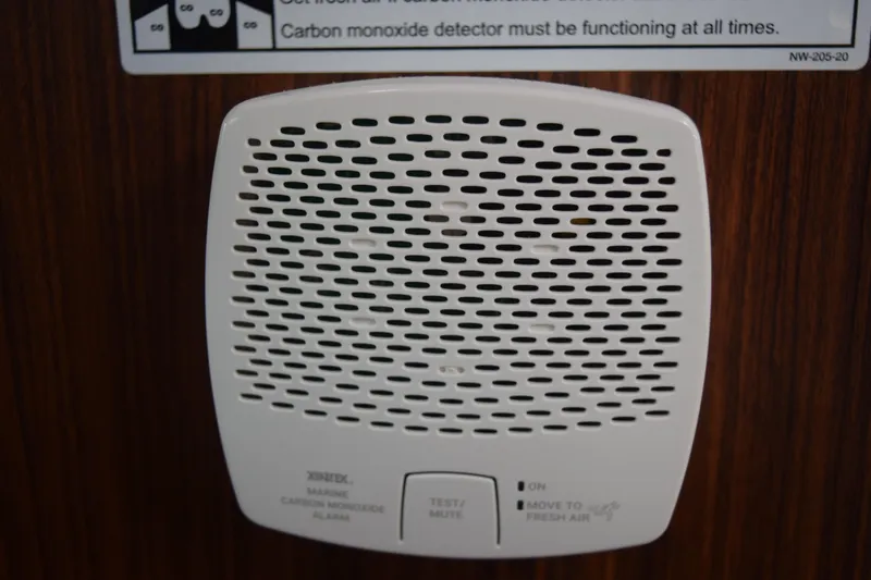  Yacht Photos Pics Carbon monoxide detector on 2022 Pursuit OS 355 Offshore boat interior.
