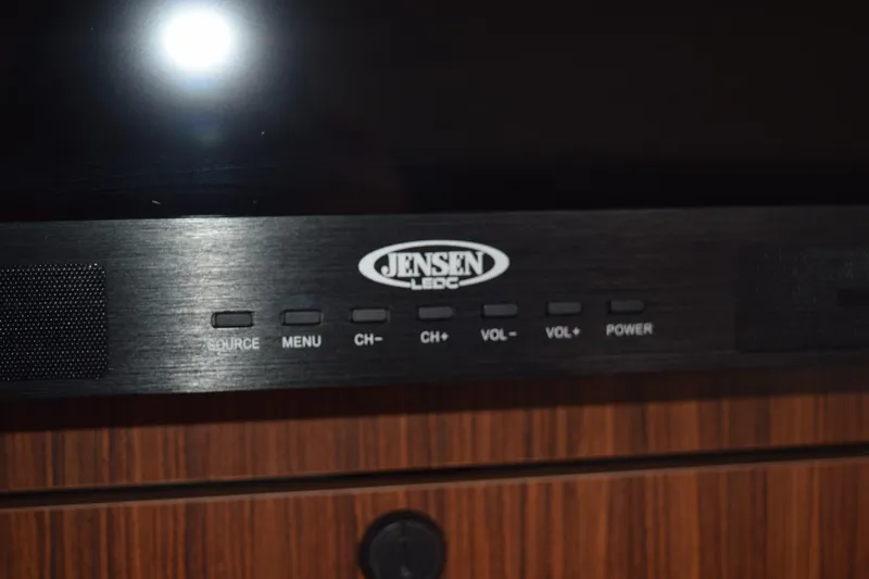  Yacht Photos Pics Jensen LED TV control panel on 2022 Pursuit OS 355 Offshore boat.