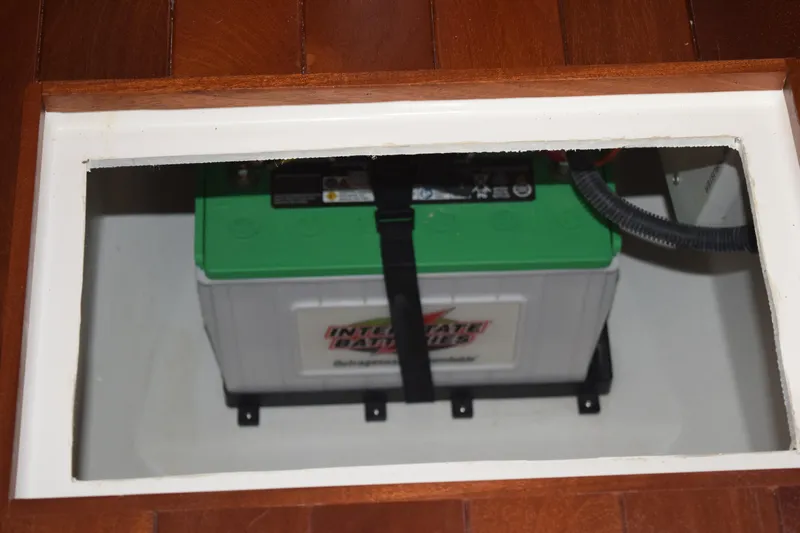  Yacht Photos Pics Battery compartment of 2022 Pursuit OS 355 Offshore boat, featuring Interstate battery.