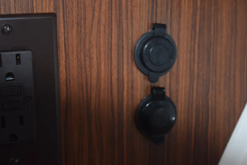  Yacht Photos Pics Power outlets on 2022 Pursuit OS 355 Offshore boat interior.