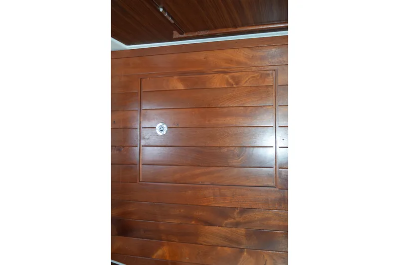  Yacht Photos Pics Wooden cabin interior of 2022 Pursuit OS 355 Offshore boat.