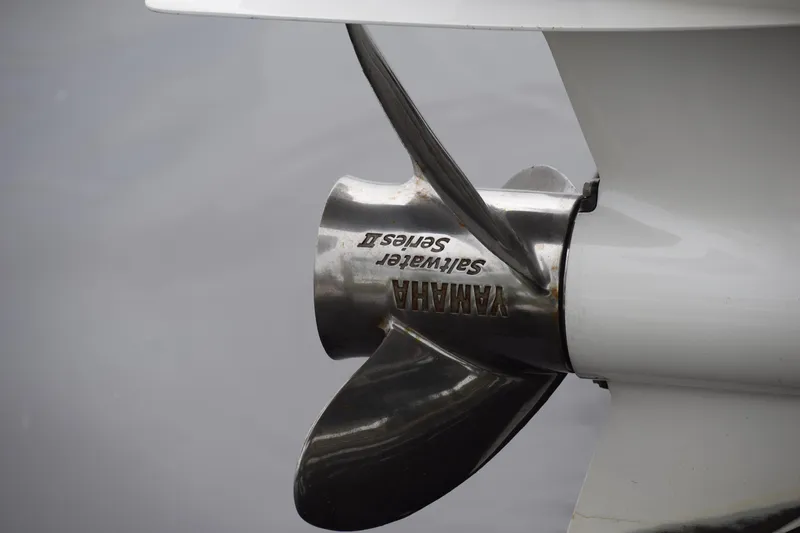  Yacht Photos Pics Close-up of Yamaha Saltwater Series II propeller on 2022 Pursuit OS 355 Offshore boat.