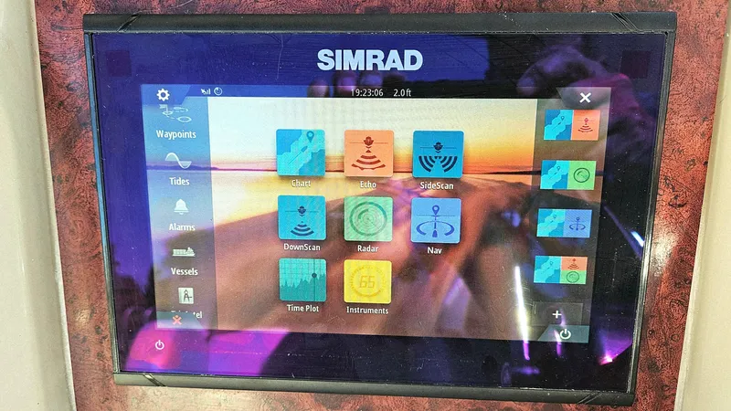  Yacht Photos Pics Simrad navigation display on 2003 Sea Ray 340 Sundancer, showing various marine functions.