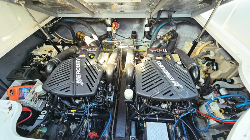  Yacht Photos Pics Engine compartment of a 2003 Sea Ray 340 Sundancer with twin Mercury engines.