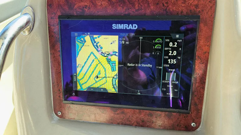  Yacht Photos Pics Simrad navigation display on 2003 Sea Ray 340 Sundancer boat dashboard.
