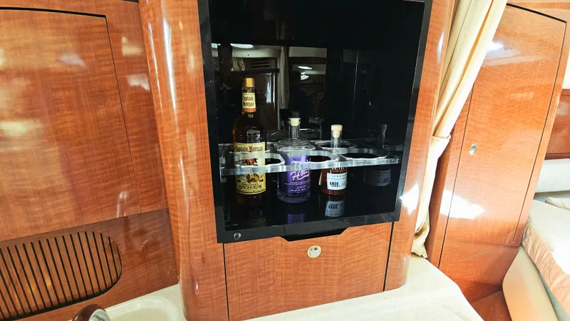  Yacht Photos Pics Luxury bar cabinet on 2003 Sea Ray 340 Sundancer yacht interior.