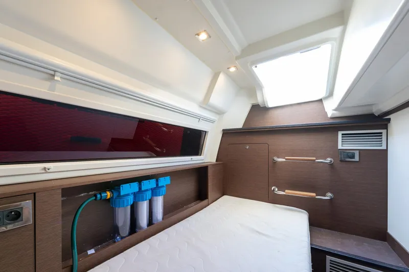 The Sun Yacht Photos Pics Interior cabin of 2020 Prestige 590 yacht with modern design and water filtration system.