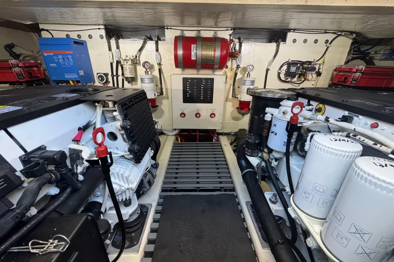 Rosalinda Yacht Photos Pics Engine room of 2015 Tiara Yachts C44 Coupe, showcasing mechanical components and systems.