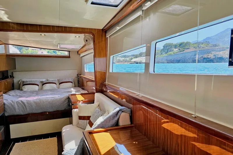 Yacht Photos Pics Luxurious interior of 2016 HH Catamarans HH66 with scenic ocean view through windows.