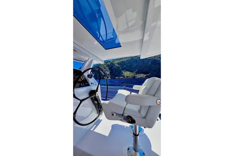  Yacht Photos Pics Helm of 2016 HH Catamarans HH66 with scenic ocean view.