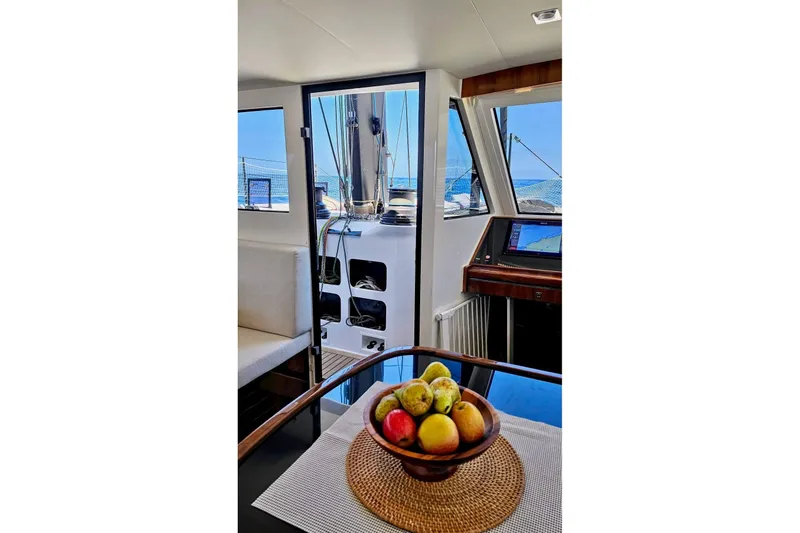  Yacht Photos Pics Interior of 2016 HH Catamarans HH66 with fruit bowl and ocean view.