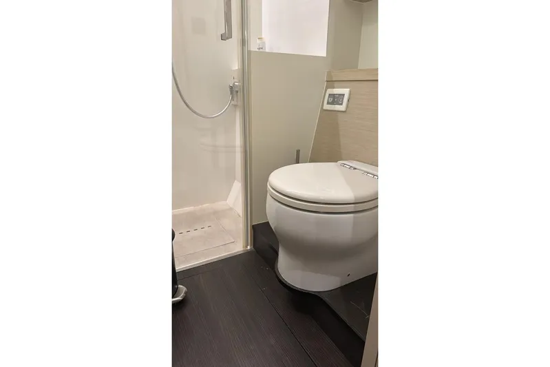 Va Bene Yacht Photos Pics Modern bathroom in 2022 Lagoon 55 yacht with shower and toilet.