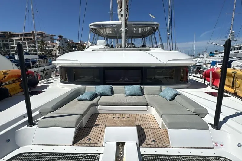 Va Bene Yacht Photos Pics Luxurious 2022 Lagoon 55 yacht with spacious deck and comfortable seating.