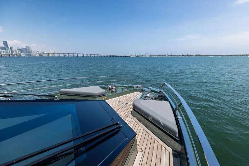 Matzu II Yacht Photos Pics Luxury yacht Wally WHY 150, 2023 model, cruising near a city skyline and bridge.