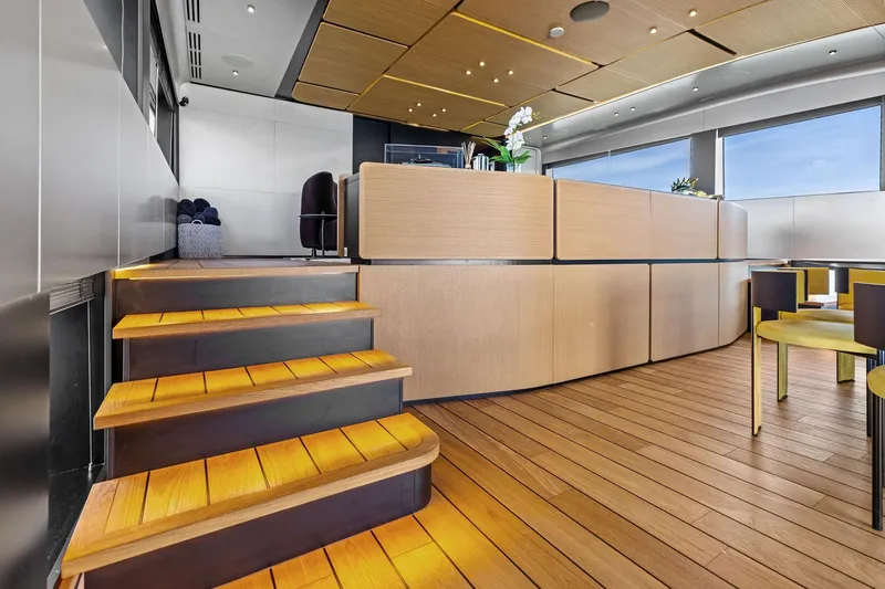 Matzu II Yacht Photos Pics Luxurious interior of 2023 Wally WHY 150 yacht with modern wooden design and elegant furnishings.