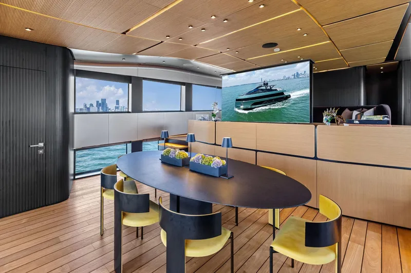 Matzu II Yacht Photos Pics Luxurious interior of 2023 Wally WHY 150 yacht with modern dining area and sea view.
