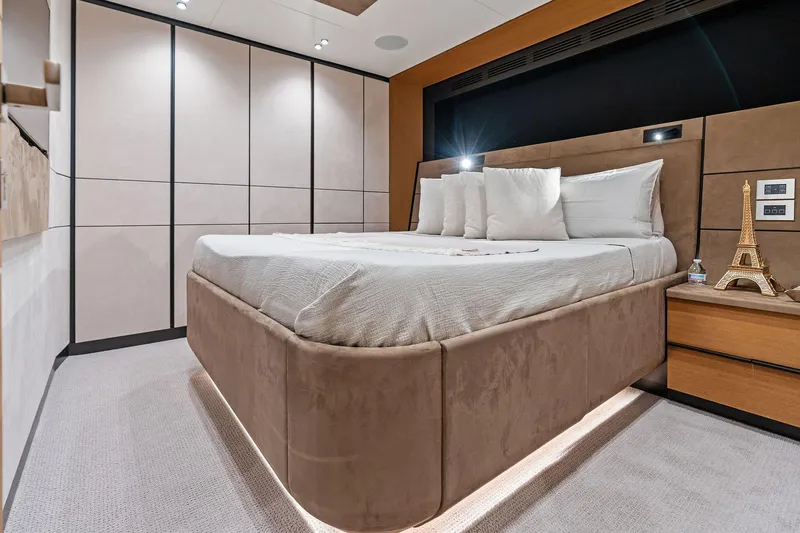 Matzu II Yacht Photos Pics Luxurious bedroom interior of 2023 Wally WHY 150 yacht with modern design and elegant decor.