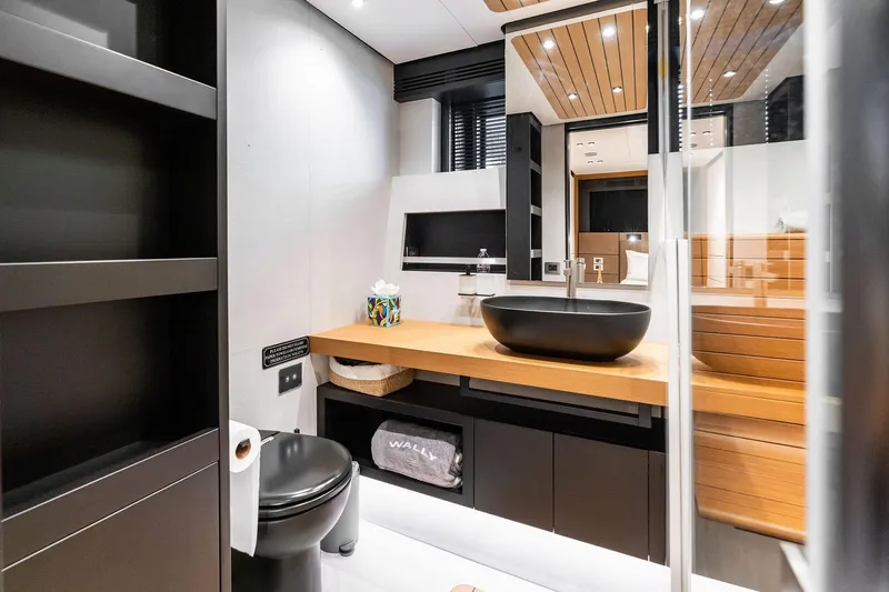 Matzu II Yacht Photos Pics Modern bathroom interior on 2023 Wally WHY 150 yacht, featuring sleek design and wooden accents.