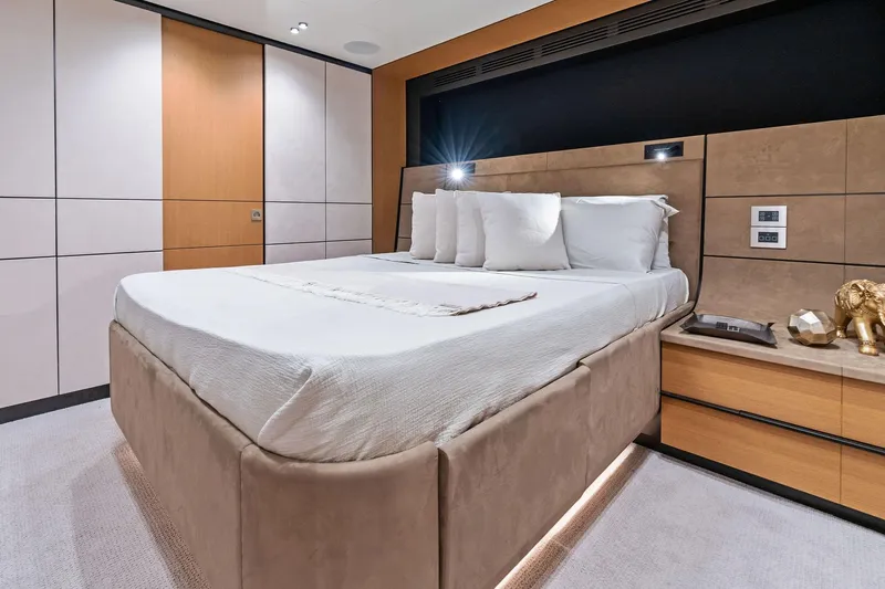Matzu II Yacht Photos Pics Luxurious bedroom interior of 2023 Wally WHY 150 yacht with modern design and elegant decor.