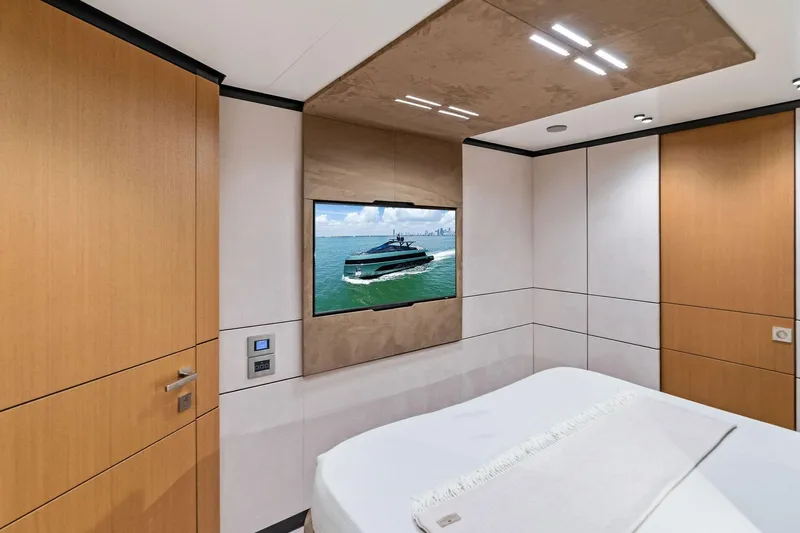 Matzu II Yacht Photos Pics Luxurious interior of 2023 Wally WHY 150 yacht with modern design and wall-mounted TV.