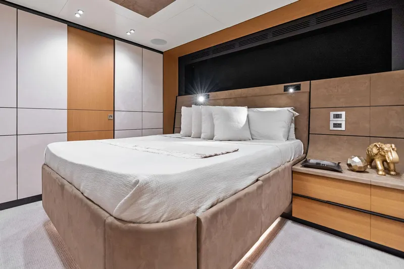 Matzu II Yacht Photos Pics Luxurious bedroom interior of 2023 Wally WHY 150 yacht with modern design elements.