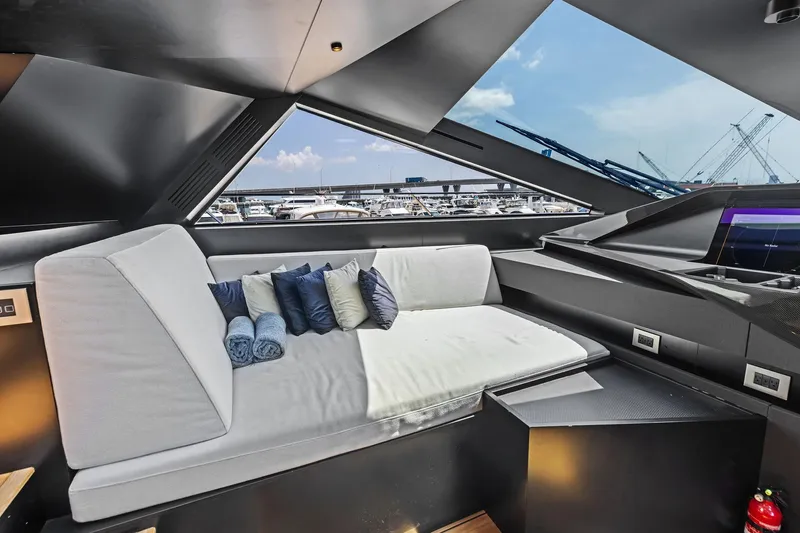 Matzu II Yacht Photos Pics Luxurious interior of 2023 Wally WHY 150 yacht with modern seating and panoramic windows.