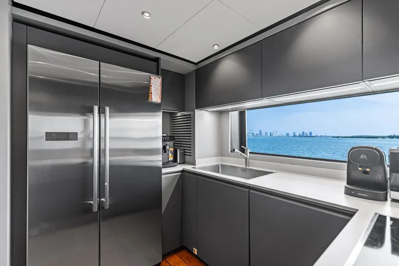 Matzu II Yacht Photos Pics Modern kitchen interior on 2023 Wally WHY 150 yacht with ocean view.