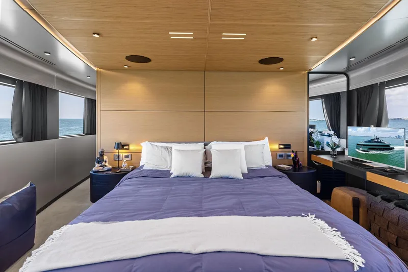 Matzu II Yacht Photos Pics Luxurious bedroom interior of 2023 Wally WHY 150 yacht with ocean view.